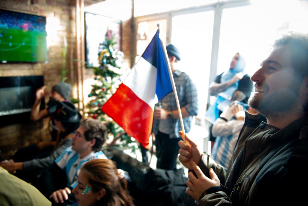 One French fan surrounded by Argentina fans watching the World Cup finals in Toronto at AC Ranch on St Clair Avenue West