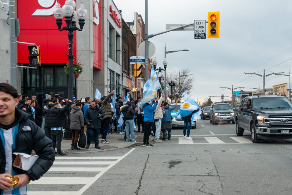 Argentina fans in Toronto celebrating after winning the World Cup finals on St Clair Avenue West